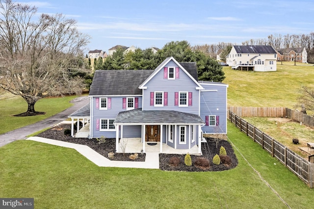 exterior space featuring a patio and a front yard