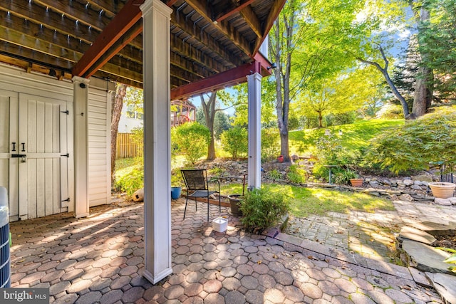 view of patio / terrace with fence