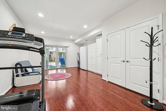 exercise area with dark hardwood / wood-style floors