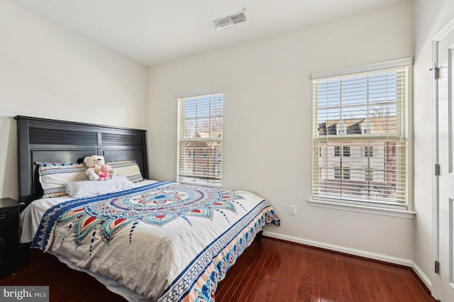 bedroom featuring dark hardwood / wood-style floors