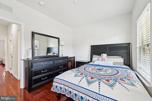 bedroom featuring dark hardwood / wood-style floors