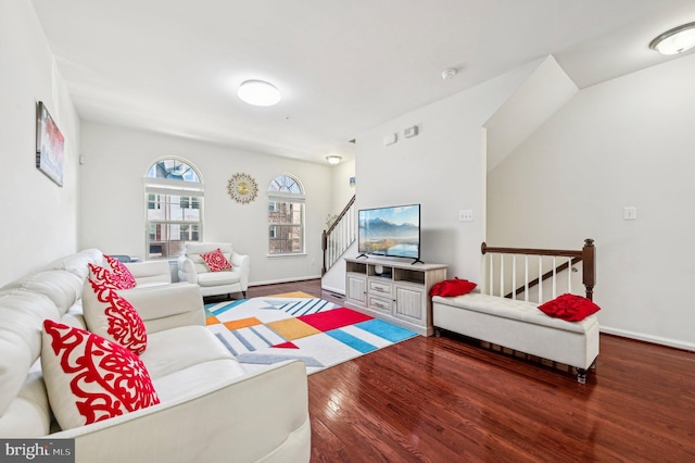 living room featuring dark wood-type flooring