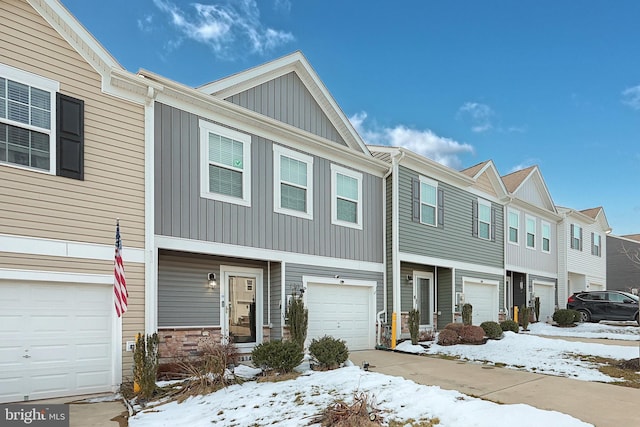 multi unit property featuring a garage