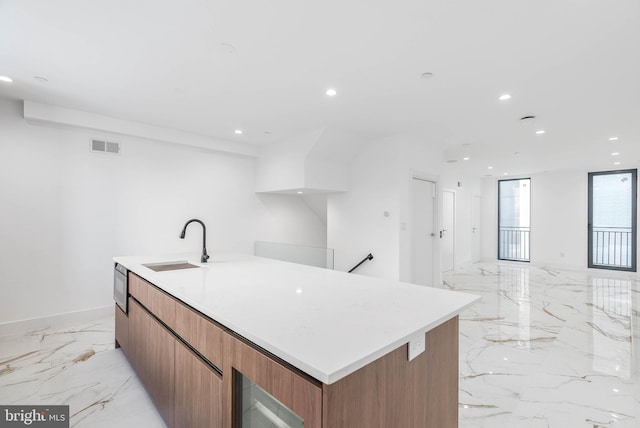 kitchen with a large island and sink