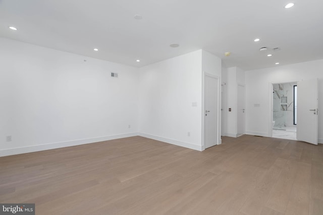 empty room featuring light hardwood / wood-style floors