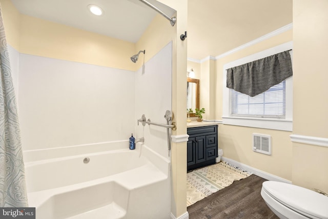 full bathroom with ornamental molding, shower / tub combo, vanity, and toilet