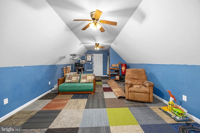 rec room with lofted ceiling and ceiling fan