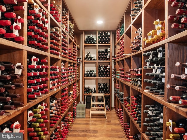 wine cellar featuring hardwood / wood-style flooring