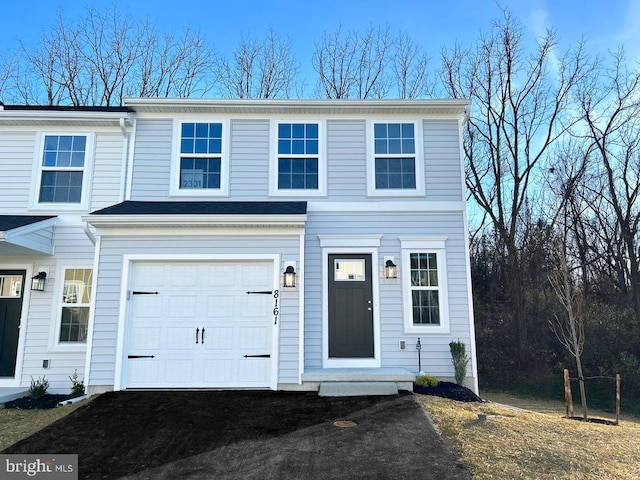 view of front of property featuring an attached garage