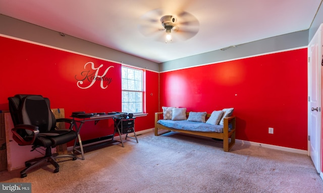 interior space featuring ceiling fan and carpet