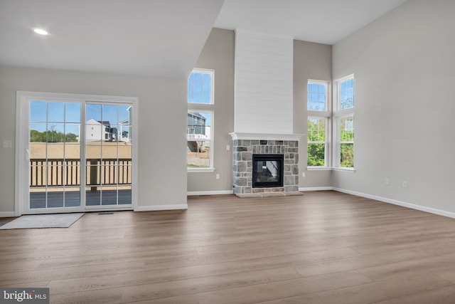 111 Jennifer Cir, Harrisburg, PA 17112 - unfurnished living room with high vaulted ceiling, wood finished floors, healthy amount of natural light, and baseboards