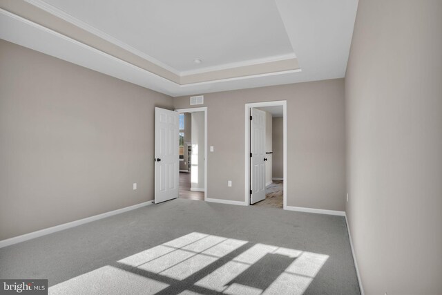 111 Jennifer Cir, Harrisburg, PA 17112 - unfurnished bedroom with a tray ceiling, carpet flooring, baseboards, and crown molding