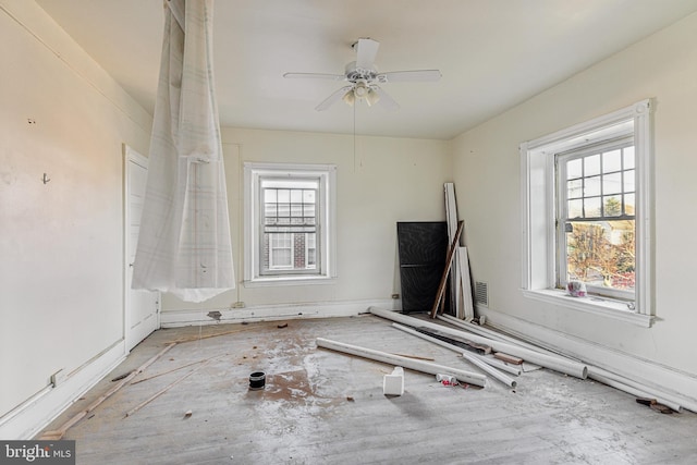 spare room with ceiling fan