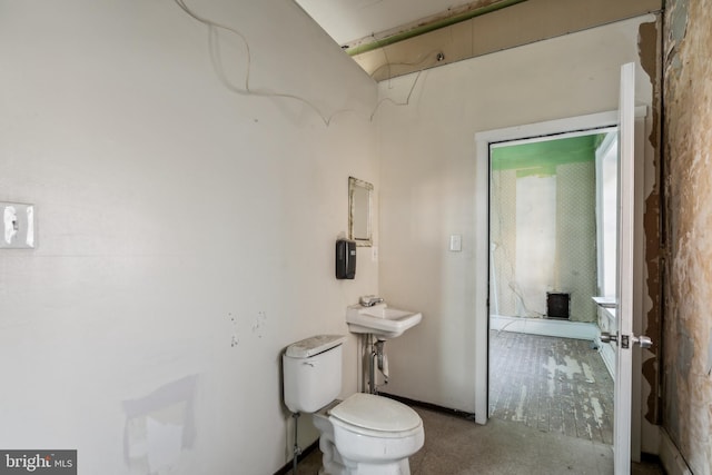 bathroom with sink and toilet