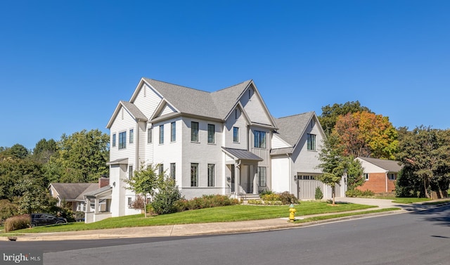 view of front of home featuring a front lawn