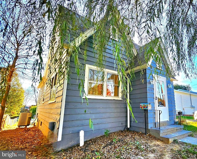 view of home's exterior featuring cooling unit