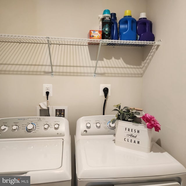 laundry area featuring independent washer and dryer