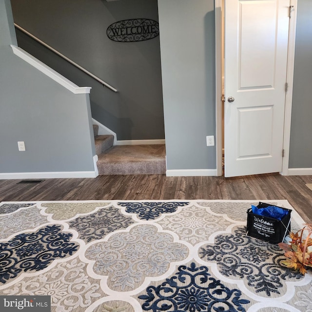 entrance foyer featuring hardwood / wood-style floors