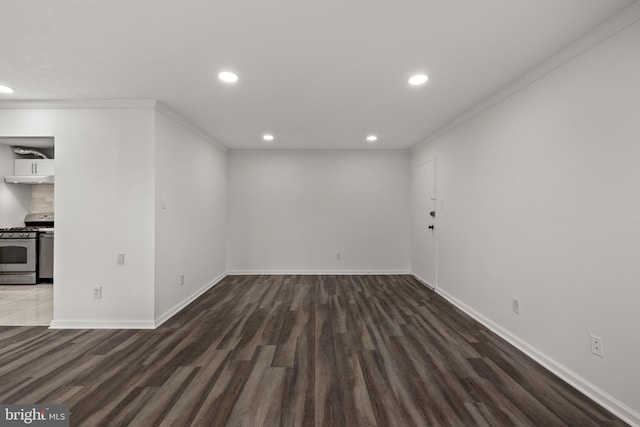 interior space featuring crown molding and dark hardwood / wood-style floors