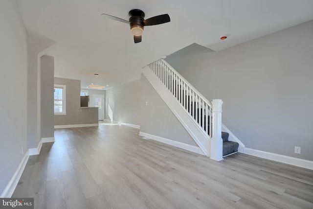 interior space featuring ceiling fan and light hardwood / wood-style flooring