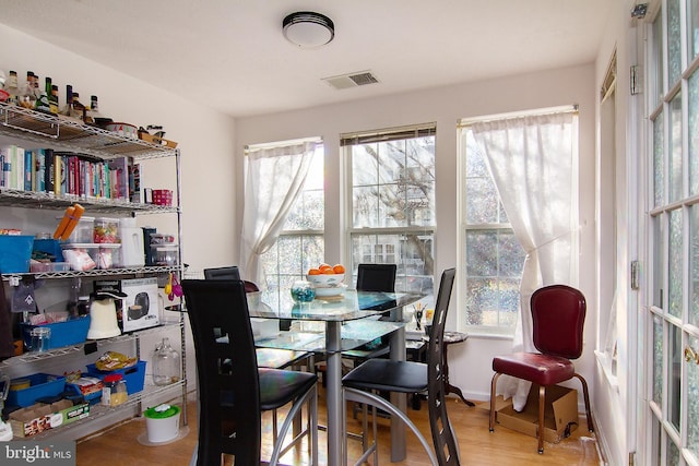 dining room featuring hardwood / wood-style flooring