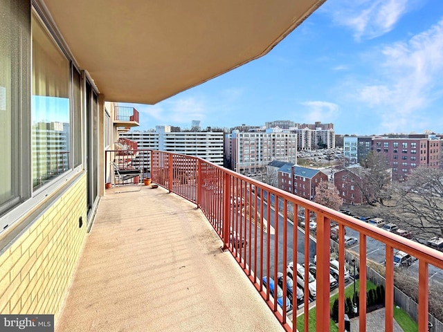 balcony featuring a city view