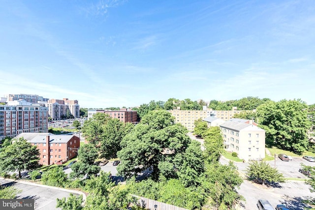 birds eye view of property with a view of city