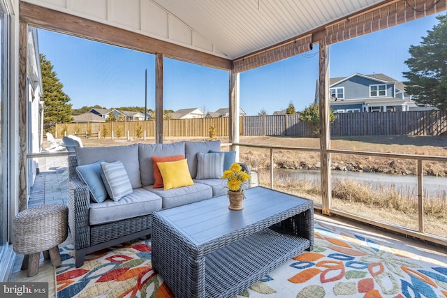 sunroom with lofted ceiling