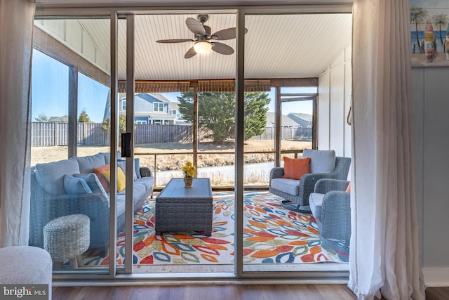 interior space featuring ceiling fan