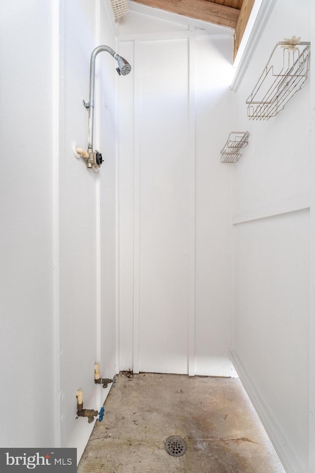 bathroom with concrete flooring