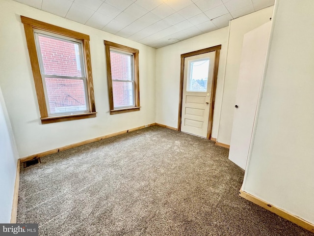 spare room with carpet flooring