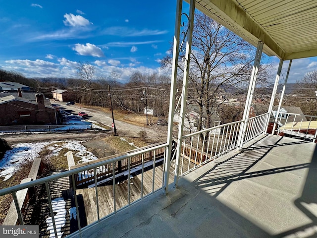 view of snow covered deck