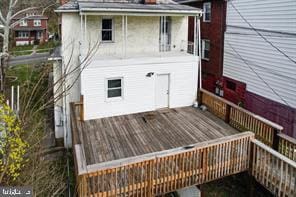 rear view of house with a deck