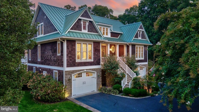 view of front of property featuring a garage