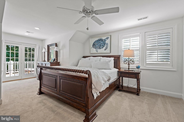 bedroom featuring access to exterior, light colored carpet, and ceiling fan