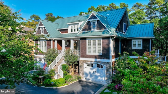 view of front of property with a garage