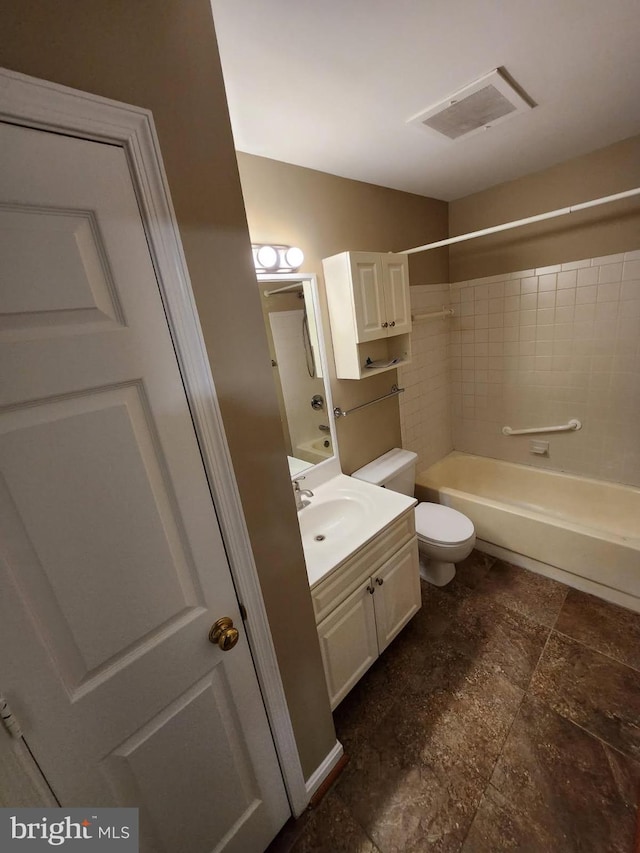 bathroom with toilet, bathing tub / shower combination, visible vents, and vanity