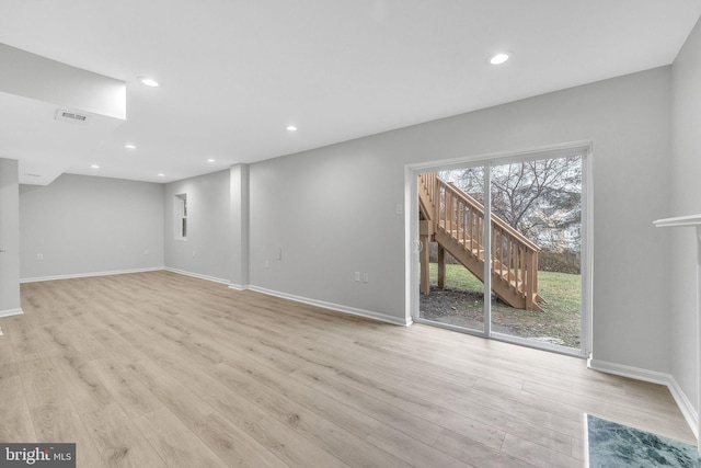 unfurnished room featuring light wood-type flooring