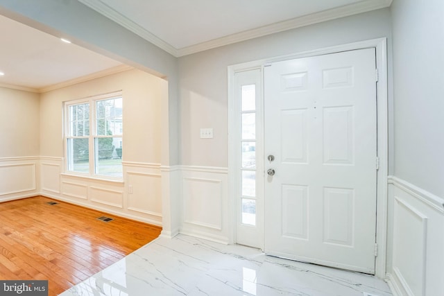 foyer with crown molding