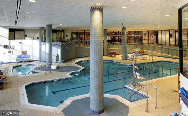 view of pool featuring an indoor hot tub