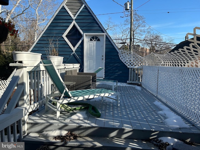 exterior space featuring a wooden deck