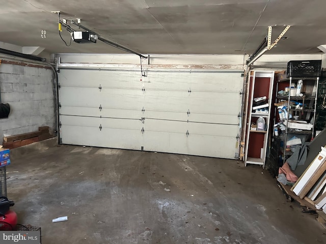 garage featuring a garage door opener