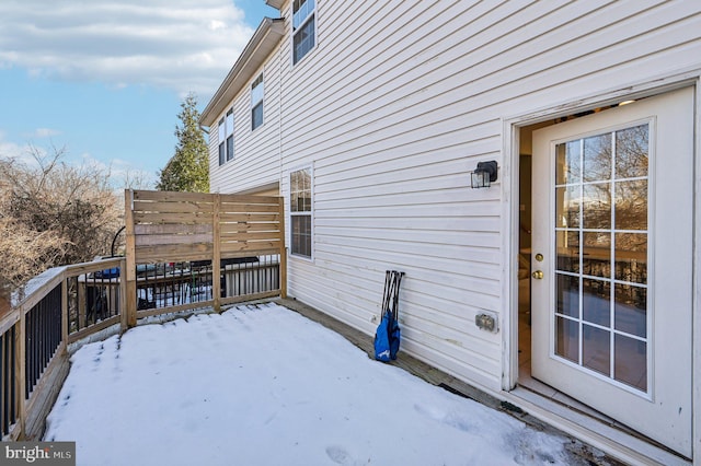 view of snow covered deck