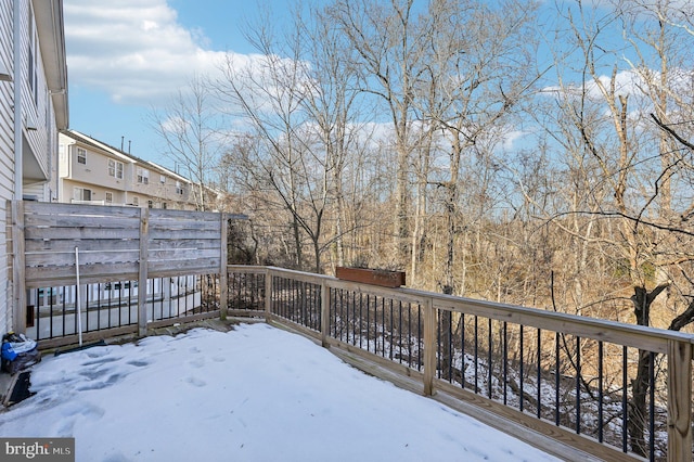 view of snow covered deck