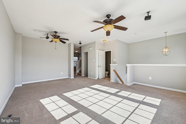 unfurnished living room with light carpet