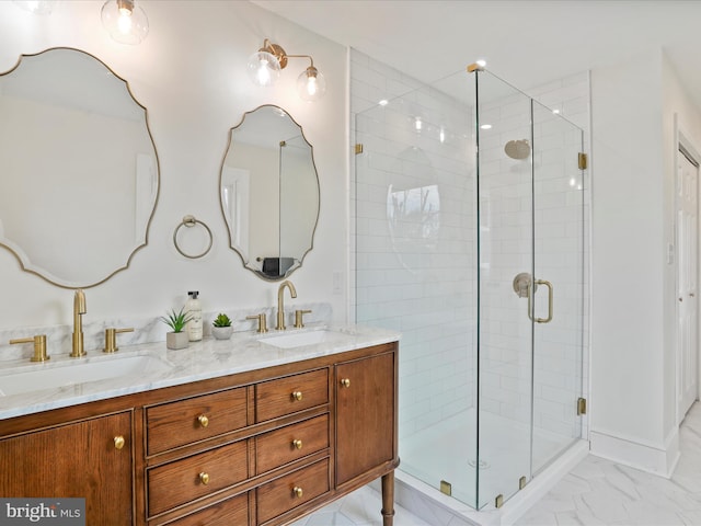 bathroom with walk in shower and vanity