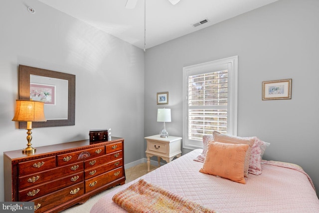 bedroom with light carpet