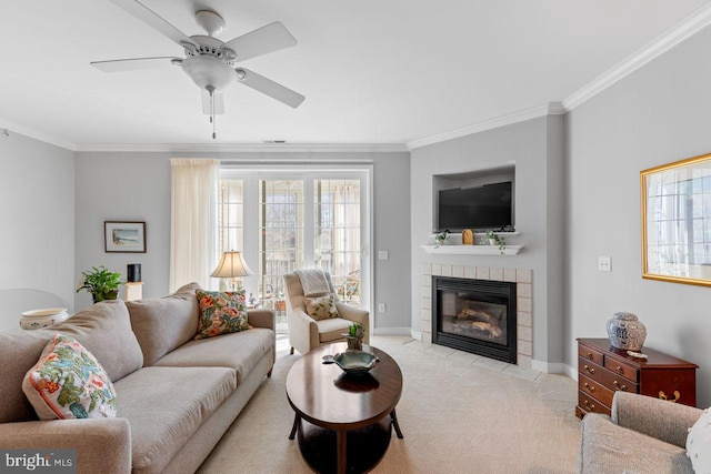 carpeted living room with a fireplace, ornamental molding, and a healthy amount of sunlight