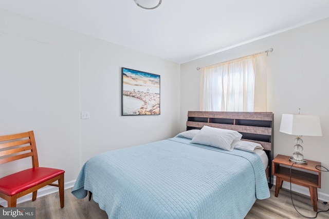 bedroom featuring light hardwood / wood-style flooring