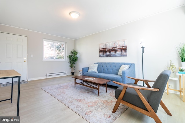 living room featuring hardwood / wood-style flooring and baseboard heating